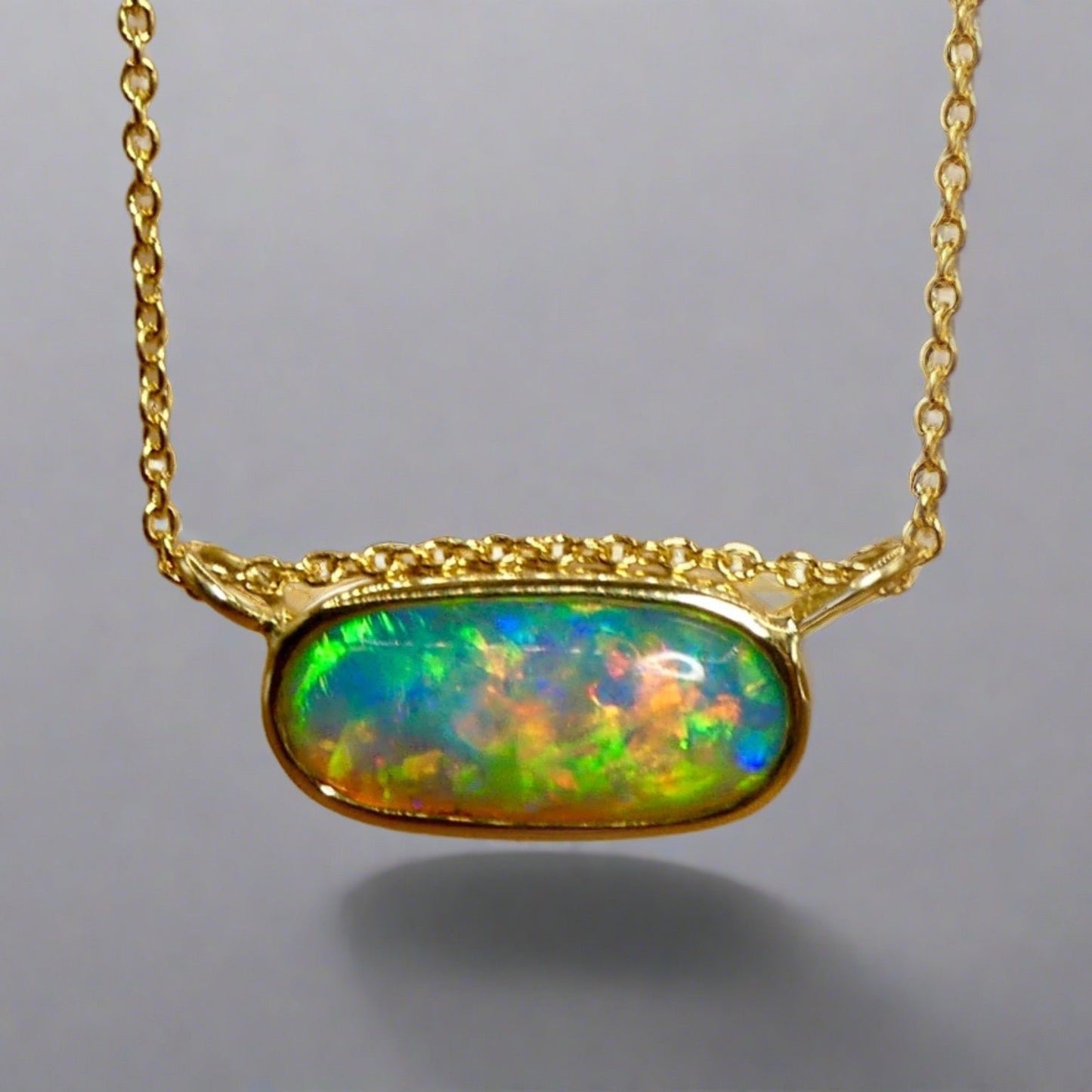 Experience the brilliance of our 18k Gold Australian Crystal Opal Pendant. Ethically mined from Coober Pedy, Australia, this opal is a stunning representation of the outback's natural beauty
Origin- Coober Pedy Australia
Opal Weight- 3ct Australian Crystal Opal
Setting- 18k Gold Bezel Set
Chain- 18k Gold Cable, 45cm in Length
Handcrafted and designed by Australian Artisans