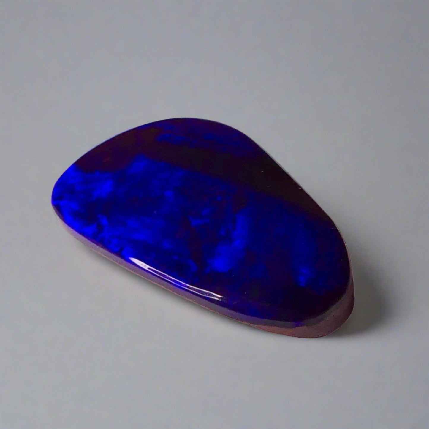 7.5ct Australian Boulder Opal showcases stunning blue flashes and deep electric blue hues, a worthy addition to any gemstone collection.
Origin- Queensland Australia
Opal Weight- 7.5ct
Size- 18.2 x 11mm
Ready to be set into your choice of jewellery
