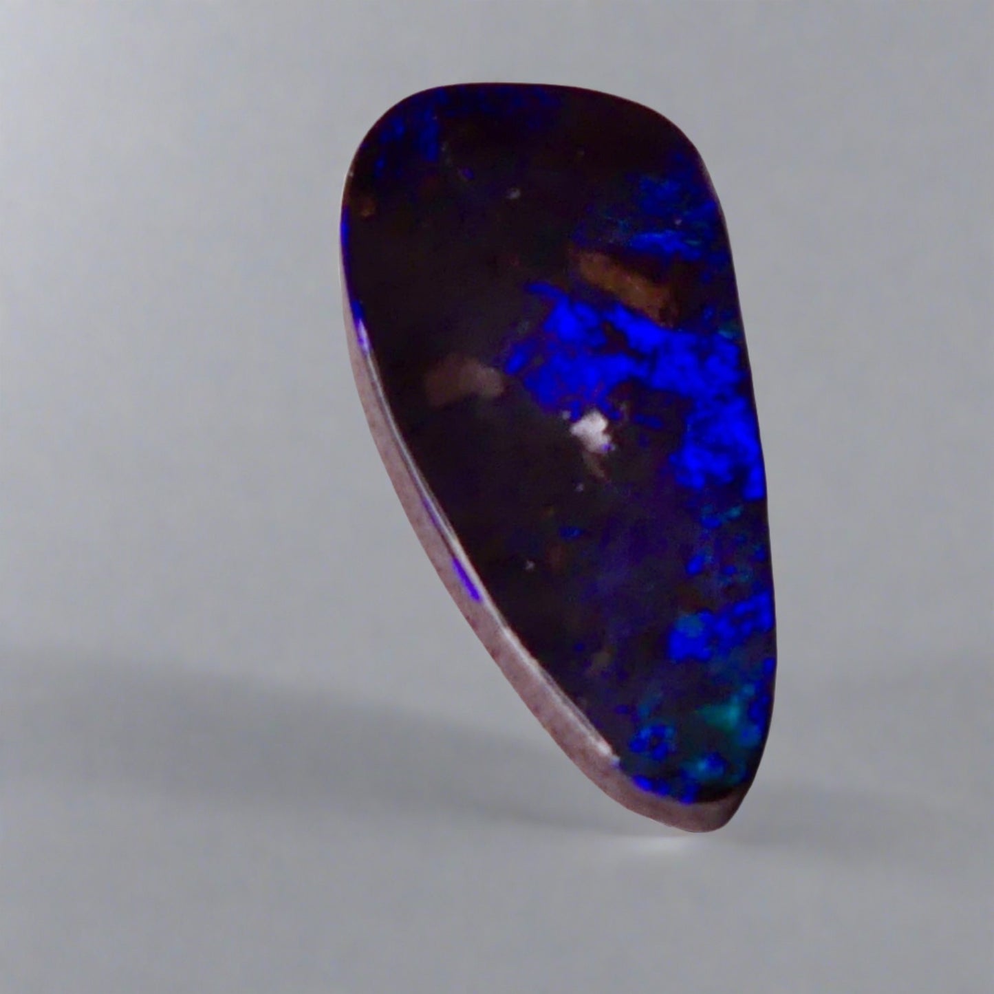 7.7ct Australian Boulder Opal showcases stunning blue hues, a worthy addition to any gemstone collection.
Origin- Ethically Mined in Queensland Australia
Opal Weight- 7.7ct
Size- 21 x 9.6mm
Ready to be set into your choice of jewellery