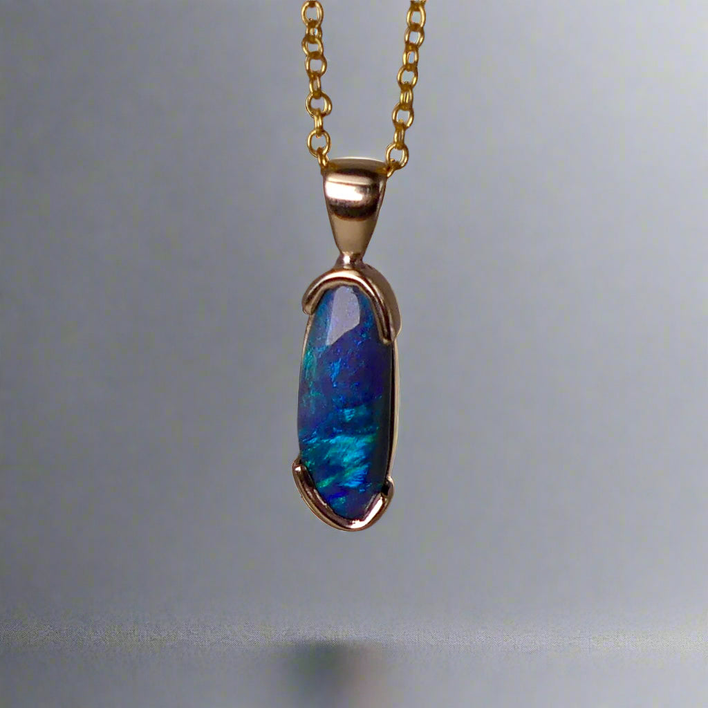 This exquisite pendant features an elegant 9k gold setting, making it a timeless addition to any jewelry collection. The centerpiece is a rare Lightning Ridge semi black crystal opal, known for its striking color and natural beauty. Add a touch of luxury to any outfit with this stunning pendant.
Origin- Ethically Mined From Lightning Ridge Australia
Opal- 2.1ct Lightning Ridge Semi Black Crystal Opal
Setting- 9k Gold Bezel Set
Pendant Size- 27.3x7.3mm Including Bail