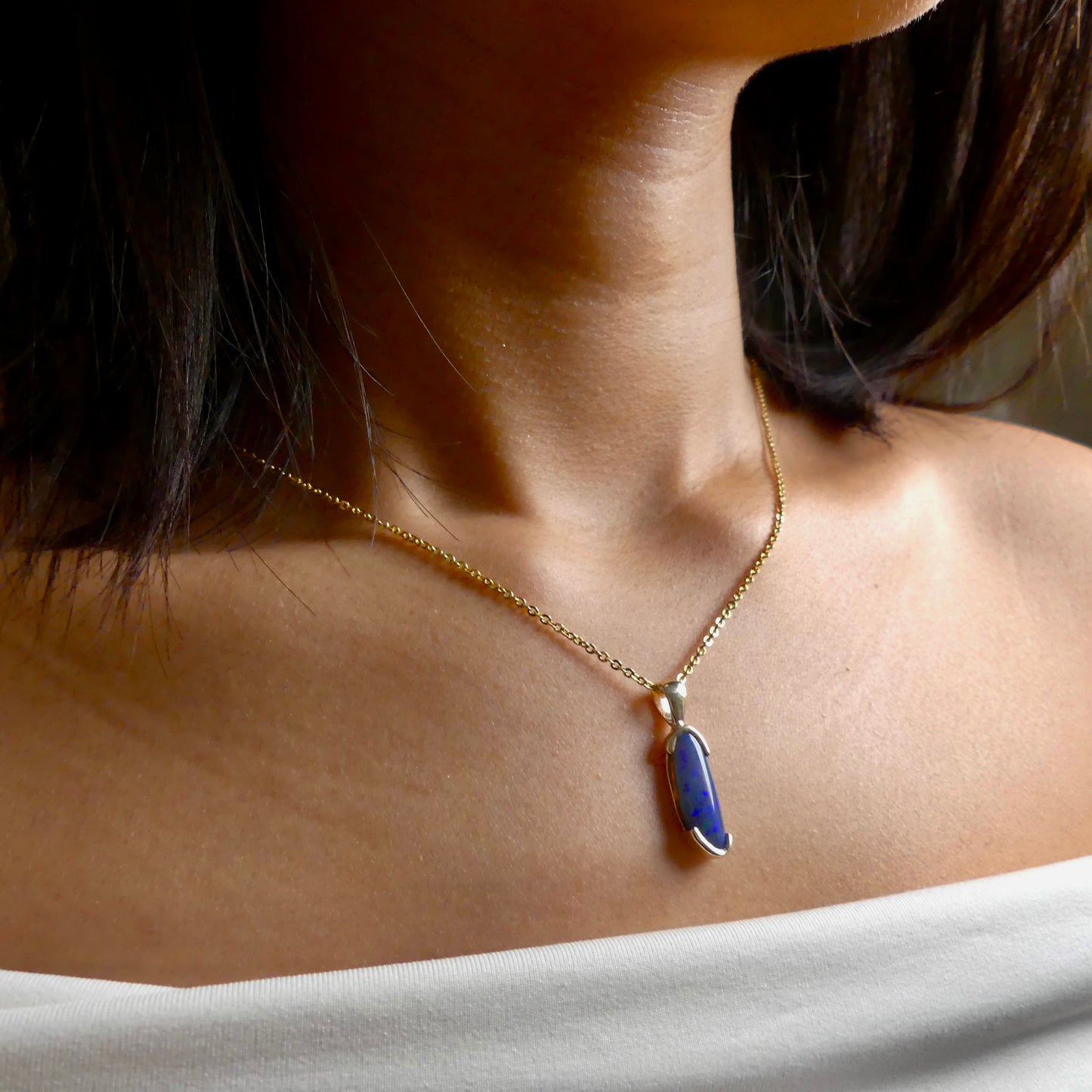 Elegant 9k Gold Lightning Ridge Semi Black Opal Pendant