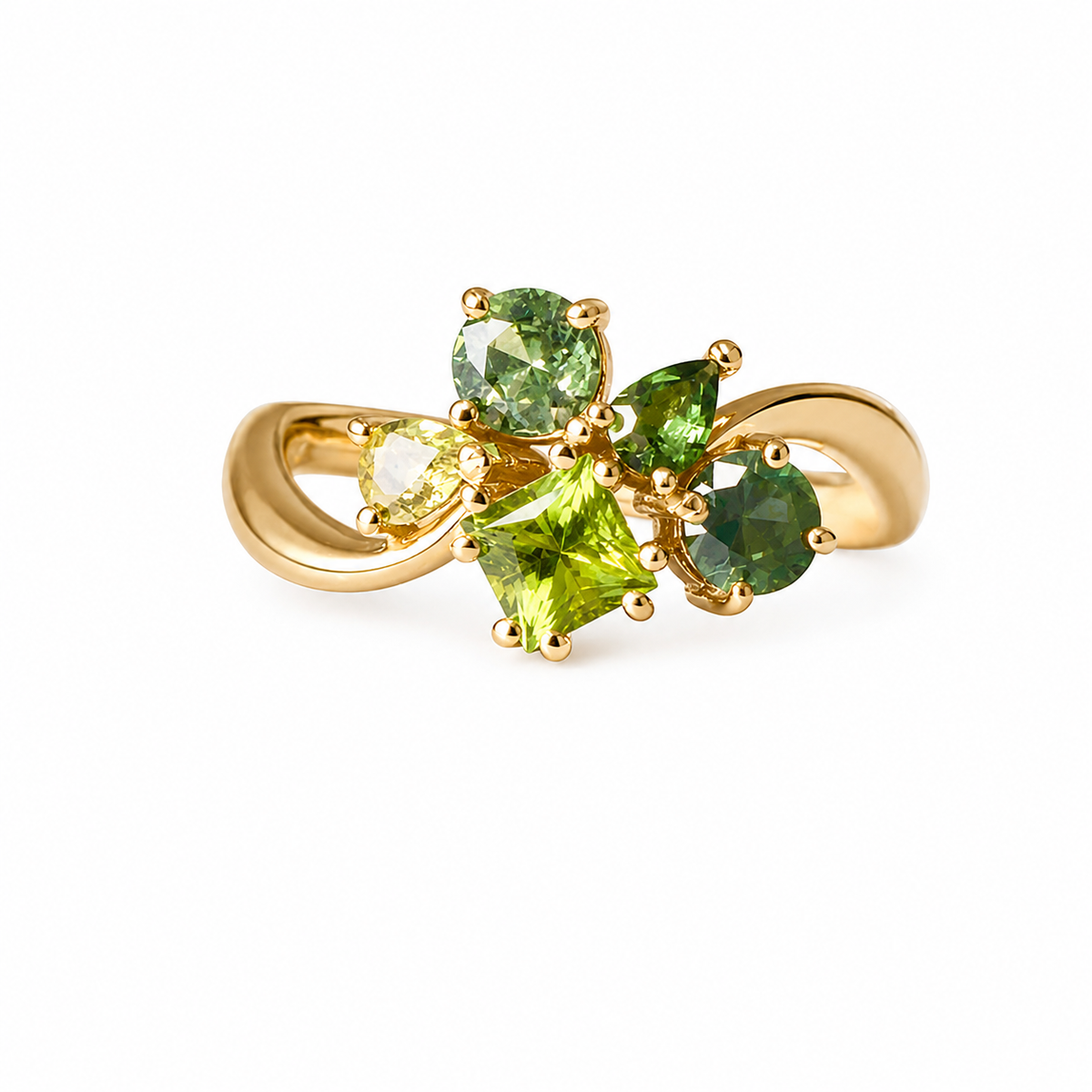 A gold ring featuring a cluster of green gemstones, including a prominent square-cut lime green center stone and smaller round and marquise-cut green stones, set on a white background.