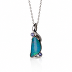 A silver pendant necklace featuring a teardrop-shaped blue-green opal stone with two small round purple gemstones set in a polished silver bail, suspended from a delicate silver chain on a white background.