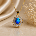 Vibrant sparkling 18K Yellow Gold Black Opal & Diamond Halo Pendant