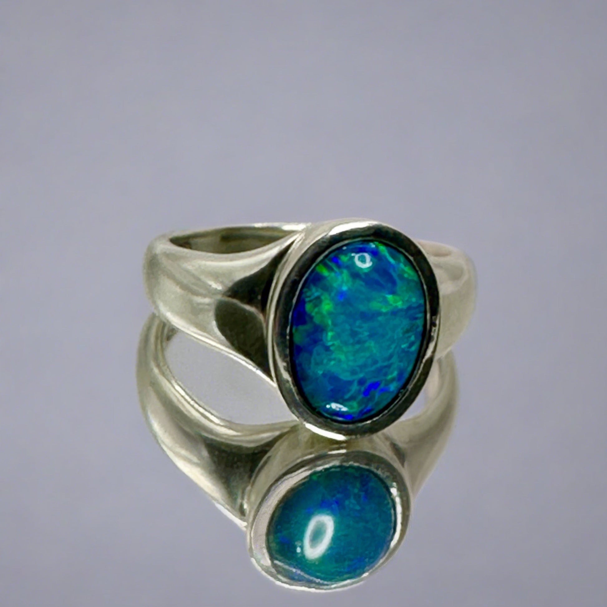 Proudly present our stunning Lightning Ridge Doublet Signet Ring, a unique fusion of classic elegance and mesmerizing opal charm.

Origin- Lightning Ridge Australia

Opal- Lightning Ridge Doublet Opal

Setting- Sterling Silver Bezel Set

Size- Ring Size 12.5us

Handcrafted with passion by Australian Artisans
