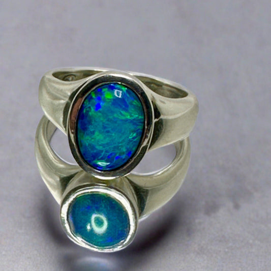 Proudly present our stunning Lightning Ridge Doublet Signet Ring, a unique fusion of classic elegance and mesmerizing opal charm.

Origin- Lightning Ridge Australia

Opal- Lightning Ridge Doublet Opal

Setting- Sterling Silver Bezel Set

Size- Ring Size 12.5us

Handcrafted with passion by Australian Artisans