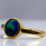 Discover our stunning Lightning Ridge Black Opal Gold Ring, crafted by expert Australian artisans. This rare gemstone is known for its breathtaking colors and exclusivity.

Origin- Lightning Ridge Australia

Opal Weight- 0.5ct Lightning Ridge Black Opal

Setting- 9K Gold Bezel Set

Size- Ring Size 6 1/4us

Handcrafted and Designed by passionate Australian Artisans
