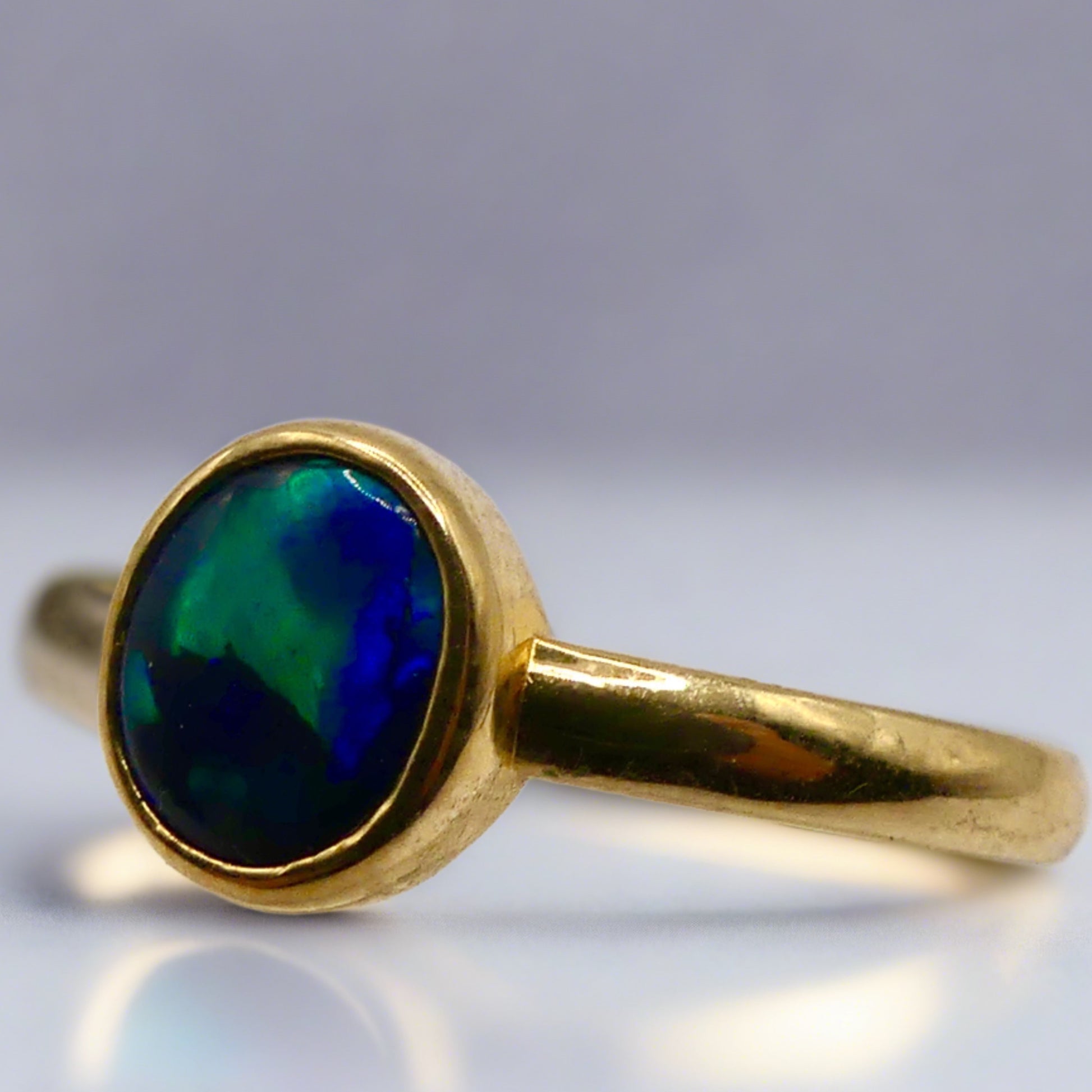 Discover our stunning Lightning Ridge Black Opal Gold Ring, crafted by expert Australian artisans. This rare gemstone is known for its breathtaking colors and exclusivity.

Origin- Lightning Ridge Australia

Opal Weight- 0.5ct Lightning Ridge Black Opal

Setting- 9K Gold Bezel Set

Size- Ring Size 6 1/4us

Handcrafted and Designed by passionate Australian Artisans
