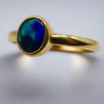 Discover our stunning Lightning Ridge Black Opal Gold Ring, crafted by expert Australian artisans. This rare gemstone is known for its breathtaking colors and exclusivity.

Origin- Lightning Ridge Australia

Opal Weight- 0.5ct Lightning Ridge Black Opal

Setting- 9K Gold Bezel Set

Size- Ring Size 6 1/4us

Handcrafted and Designed by passionate Australian Artisans
