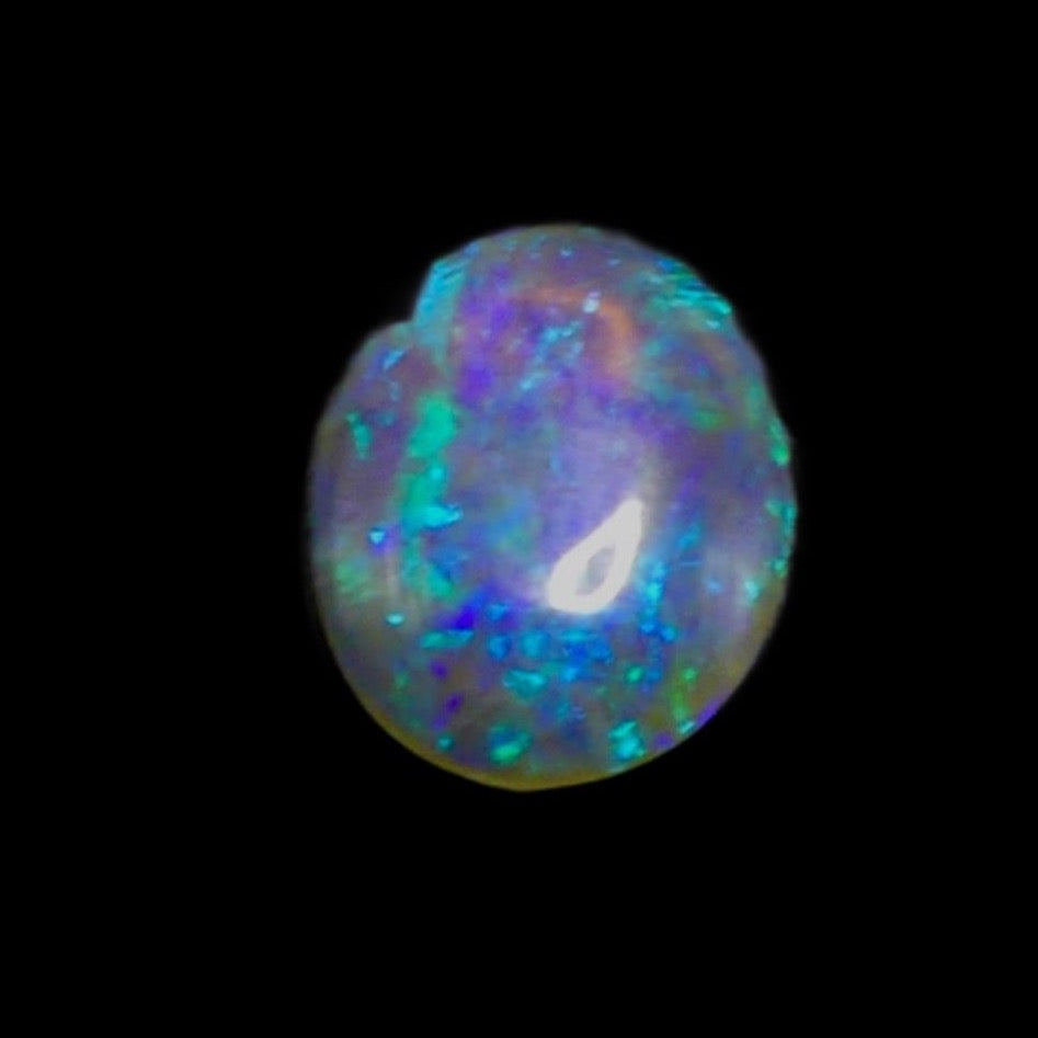 Lightning Ridge Crystal Opal – a mesmerizing gem that exudes an enchanting blend of bold blues, this opulent beauty showcases the splendor of nature.

Origin- Ethically mined in Lightning Ridge Australia

Weight- 1.7ct

Size- 11 x 9mm