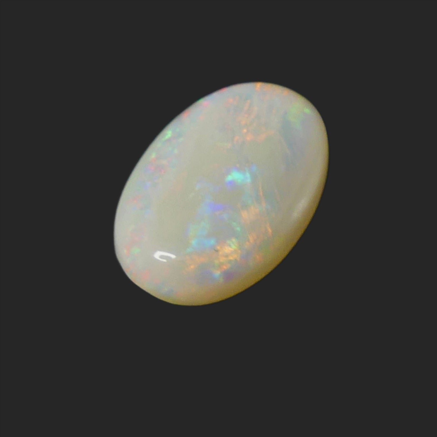 This Coober Pedy Opal showcases stunning pink and blue hues, adding a touch of elegance to any jewelry piece, perfect for any setting.

Origin- Ethically mined in Coober Pedy Australia

Weight- 4.9ct

Size- 17 x 10.6mm