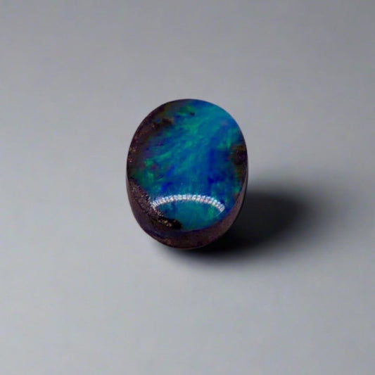 Dazzle your jewelry collection with this mesmerizing Australian Boulder Opal. Its stunning greens and blues are perfect for any design.

Origin- Ethically mined in Queensland Australia

Weight- 1.6c

Size- 9 x 7mm