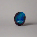 Dazzle your jewelry collection with this mesmerizing Australian Boulder Opal. Its stunning greens and blues are perfect for any design.

Origin- Ethically mined in Queensland Australia

Weight- 1.6c

Size- 9 x 7mm
