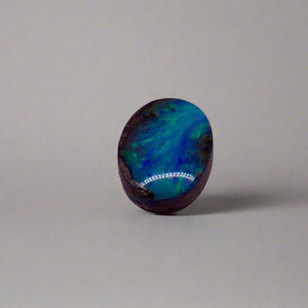 Dazzle your jewelry collection with this mesmerizing Australian Boulder Opal. Its stunning greens and blues are perfect for any design.

Origin- Ethically mined in Queensland Australia

Weight- 1.6c

Size- 9 x 7mm