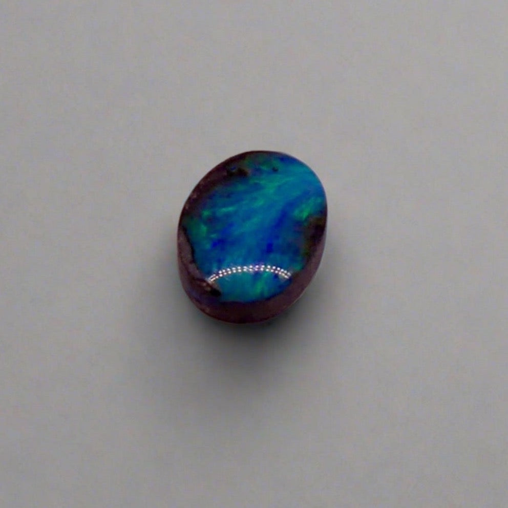 Dazzle your jewelry collection with this mesmerizing Australian Boulder Opal. Its stunning greens and blues are perfect for any design.

Origin- Ethically mined in Queensland Australia

Weight- 1.6c

Size- 9 x 7mm