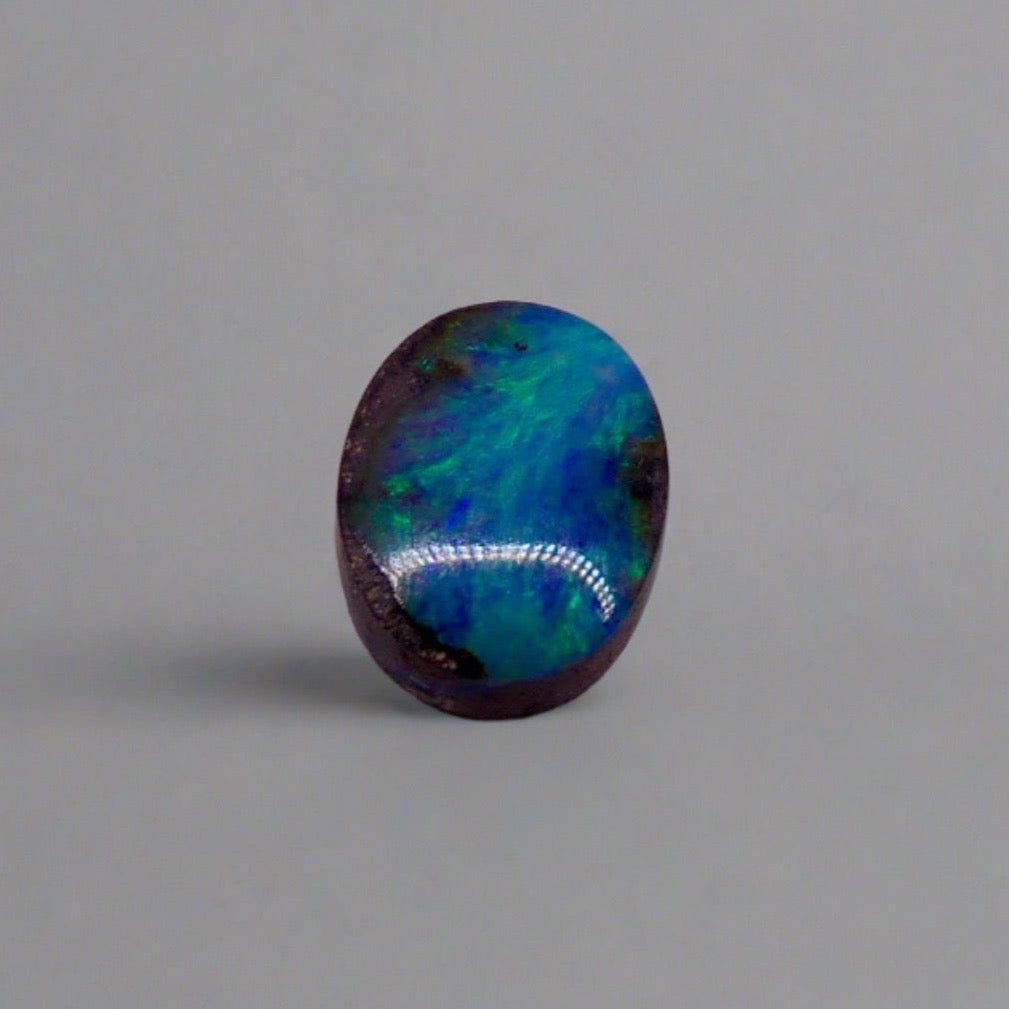 Dazzle your jewelry collection with this mesmerizing Australian Boulder Opal. Its stunning greens and blues are perfect for any design.

Origin- Ethically mined in Queensland Australia

Weight- 1.6c

Size- 9 x 7mm
