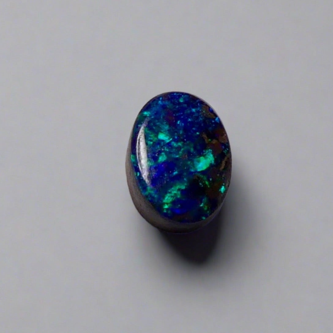 Beautiful Australian Boulder Opal, expertly sourced and cut, ready for your custom ring. Stunning greens and blues add natural beauty to your collection.

Origin- Ethically mined in Queensland Australia

Opal Weight- 0.9ct

Size- 6.7 x 5mm

Ready to be set into your one of a kind piece of jewellery