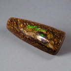Experience the stunning 27.6ct Koroit Boulder Opal. Its vibrant greens and directional flash make it a unique and breathtaking addition to any collection.

Origin- Queensland Australia

Opal Weight- 27.4ct Koroit Boulder Opal

Size- 29 x 15mm

Beautiful Opal suitable for a Pendant setting.
