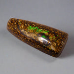 Experience the stunning 27.6ct Koroit Boulder Opal. Its vibrant greens and directional flash make it a unique and breathtaking addition to any collection.

Origin- Queensland Australia

Opal Weight- 27.4ct Koroit Boulder Opal

Size- 29 x 15mm

Beautiful Opal suitable for a Pendant setting.