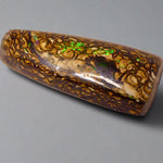Experience the stunning 27.6ct Koroit Boulder Opal. Its vibrant greens and directional flash make it a unique and breathtaking addition to any collection.

Origin- Queensland Australia

Opal Weight- 27.4ct Koroit Boulder Opal

Size- 29 x 15mm

Beautiful Opal suitable for a Pendant setting.