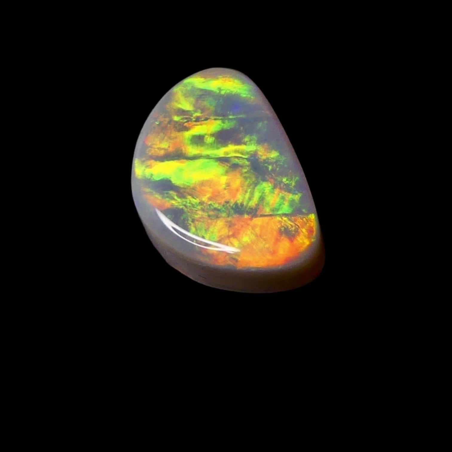 Discover the natural beauty of our 3.7ct Lightning Ridge Opal. This rare gem showcases vibrant colors of a sunrise, making it a unique addition to your opal collection.

Origin- Ethically mined in Lightning Ridge Australia

Opal Weight- 3.7ct Lightning Ridge Grey Base Opal

Size- 13.6 x 9mm

Stunning Opal ready to be set into Jewellery
