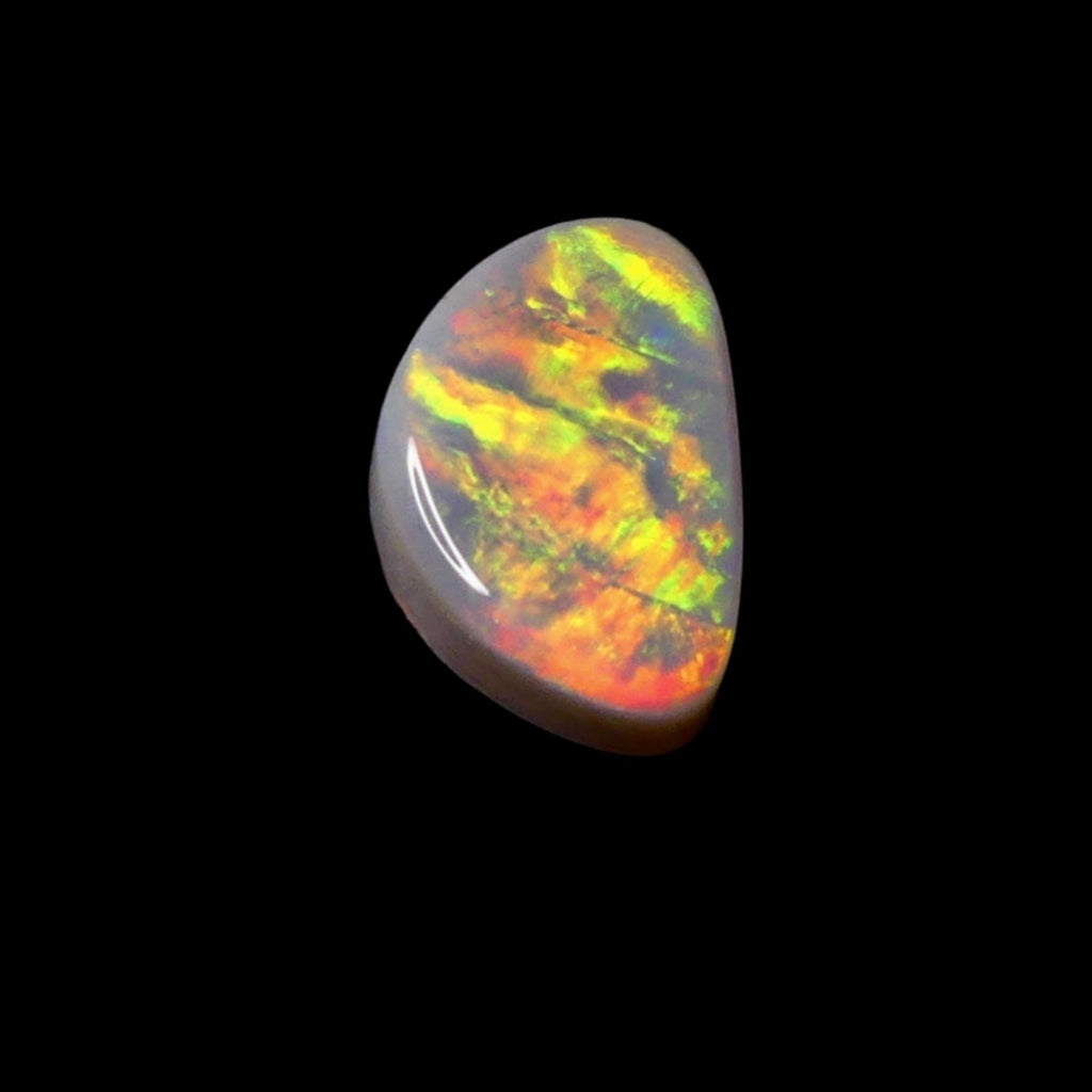 Discover the natural beauty of our 3.7ct Lightning Ridge Opal. This rare gem showcases vibrant colors of a sunrise, making it a unique addition to your opal collection.

Origin- Ethically mined in Lightning Ridge Australia

Opal Weight- 3.7ct Lightning Ridge Grey Base Opal

Size- 13.6 x 9mm

Stunning Opal ready to be set into Jewellery