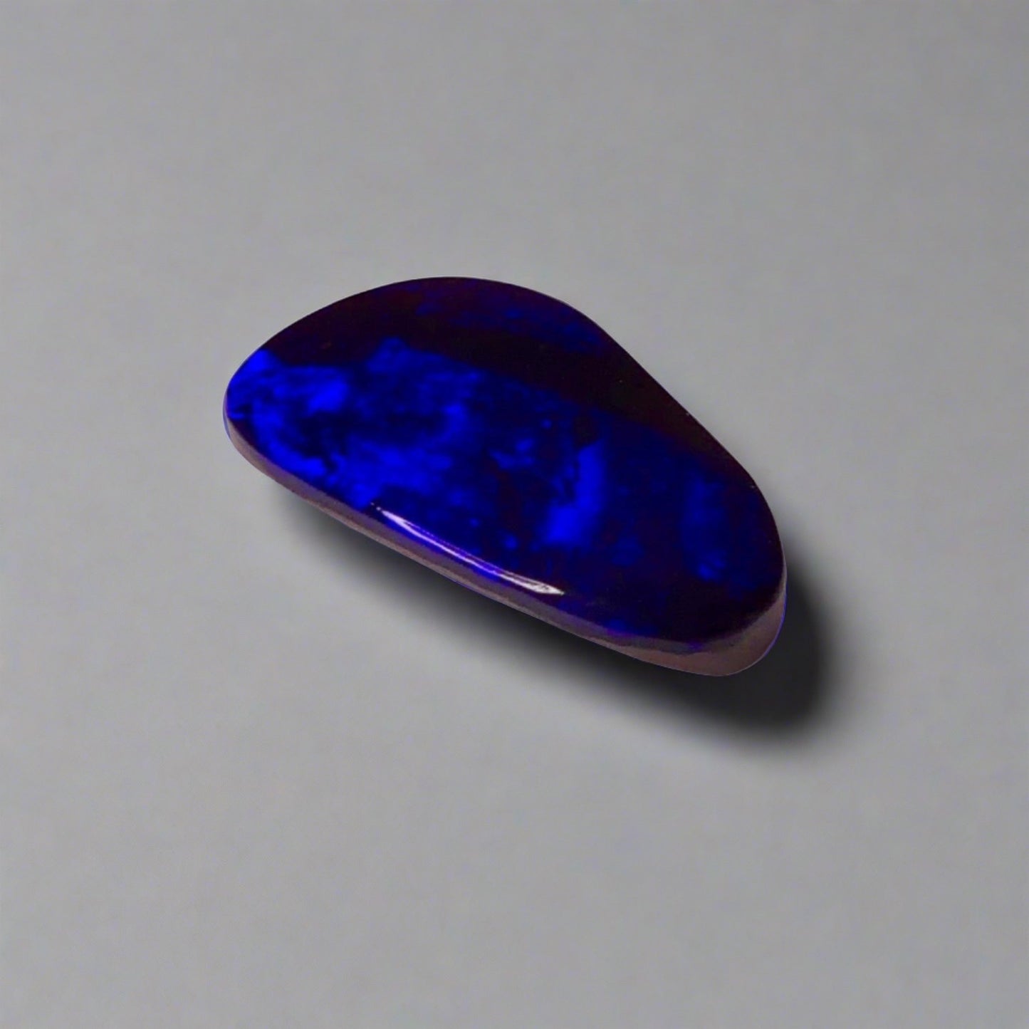 7.5ct Australian Boulder Opal showcases stunning blue flashes and deep electric blue hues, a worthy addition to any gemstone collection.

Origin- Queensland Australia

Opal Weight- 7.5ct

Size- 18.2 x 11mm

Ready to be set into your choice of jewellery