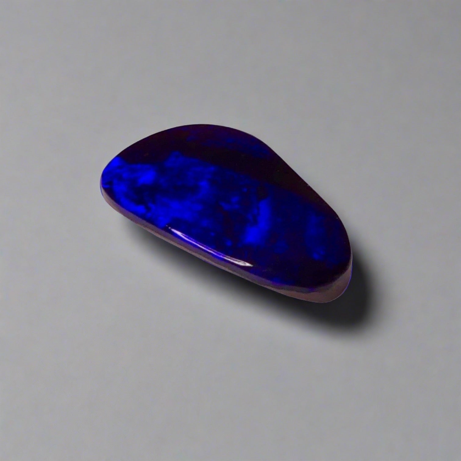 7.5ct Australian Boulder Opal showcases stunning blue flashes and deep electric blue hues, a worthy addition to any gemstone collection.

Origin- Queensland Australia

Opal Weight- 7.5ct

Size- 18.2 x 11mm

Ready to be set into your choice of jewellery