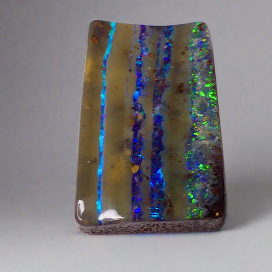 12.5ct Australian Stripy Boulder Opal: A unique gemstone, mined in Australia, that offers a one-of-a-kind look with stunning colors. Perfect for gemstone enthusiasts.

Origin- Ethically Mined in Queensland Australia

Opal Weight- 12.5ct Queensland Boulder Opal

Size- 22 x 13mm

Perfect for that next Pendant design you have been dreaming of.