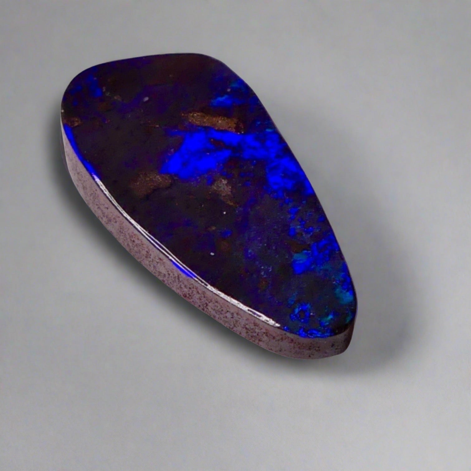 7.7ct Australian Boulder Opal showcases stunning blue hues, a worthy addition to any gemstone collection.

Origin- Ethically Mined in Queensland Australia

Opal Weight- 7.7ct

Size- 21 x 9.6mm

Ready to be set into your choice of jewellery