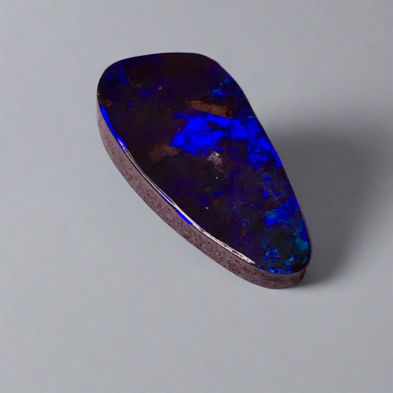 7.7ct Australian Boulder Opal showcases stunning blue hues, a worthy addition to any gemstone collection.

Origin- Ethically Mined in Queensland Australia

Opal Weight- 7.7ct

Size- 21 x 9.6mm

Ready to be set into your choice of jewellery