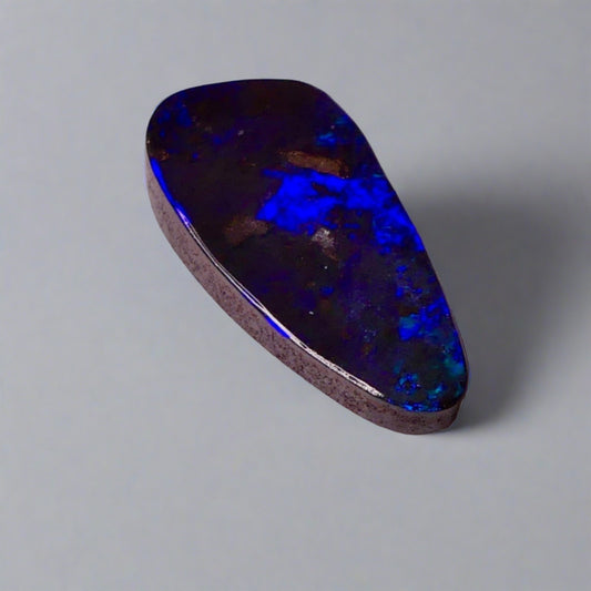 7.7ct Australian Boulder Opal showcases stunning blue hues, a worthy addition to any gemstone collection.

Origin- Ethically Mined in Queensland Australia

Opal Weight- 7.7ct

Size- 21 x 9.6mm

Ready to be set into your choice of jewellery