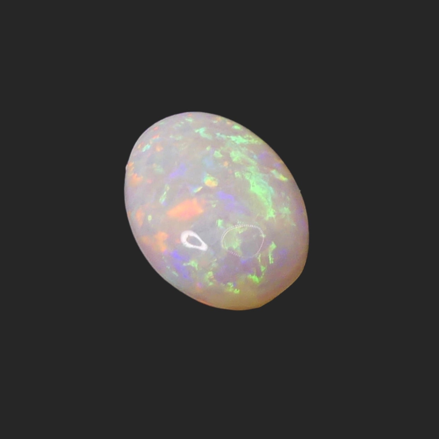 Unleash the magic of this 4ct Coober Pedy Opal! This must-have gemstone boasts captivating colors and natural beauty, perfect for making a statement in any jewelry collection. Experience the mesmerizing display of rainbow hues 

Origin-Ethically Mined in Coober Pedy Australia

Opal weight- 4ct Coober Pedy Opal

Size- 14.7 x 10.5mm

Beautiful Opal ready to set into your personally designed Jewellery setting