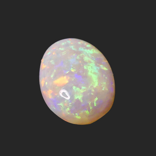 Unleash the magic of this 4ct Coober Pedy Opal! This must-have gemstone boasts captivating colors and natural beauty, perfect for making a statement in any jewelry collection. Experience the mesmerizing display of rainbow hues 

Origin-Ethically Mined in Coober Pedy Australia

Opal weight- 4ct Coober Pedy Opal

Size- 14.7 x 10.5mm

Beautiful Opal ready to set into your personally designed Jewellery setting