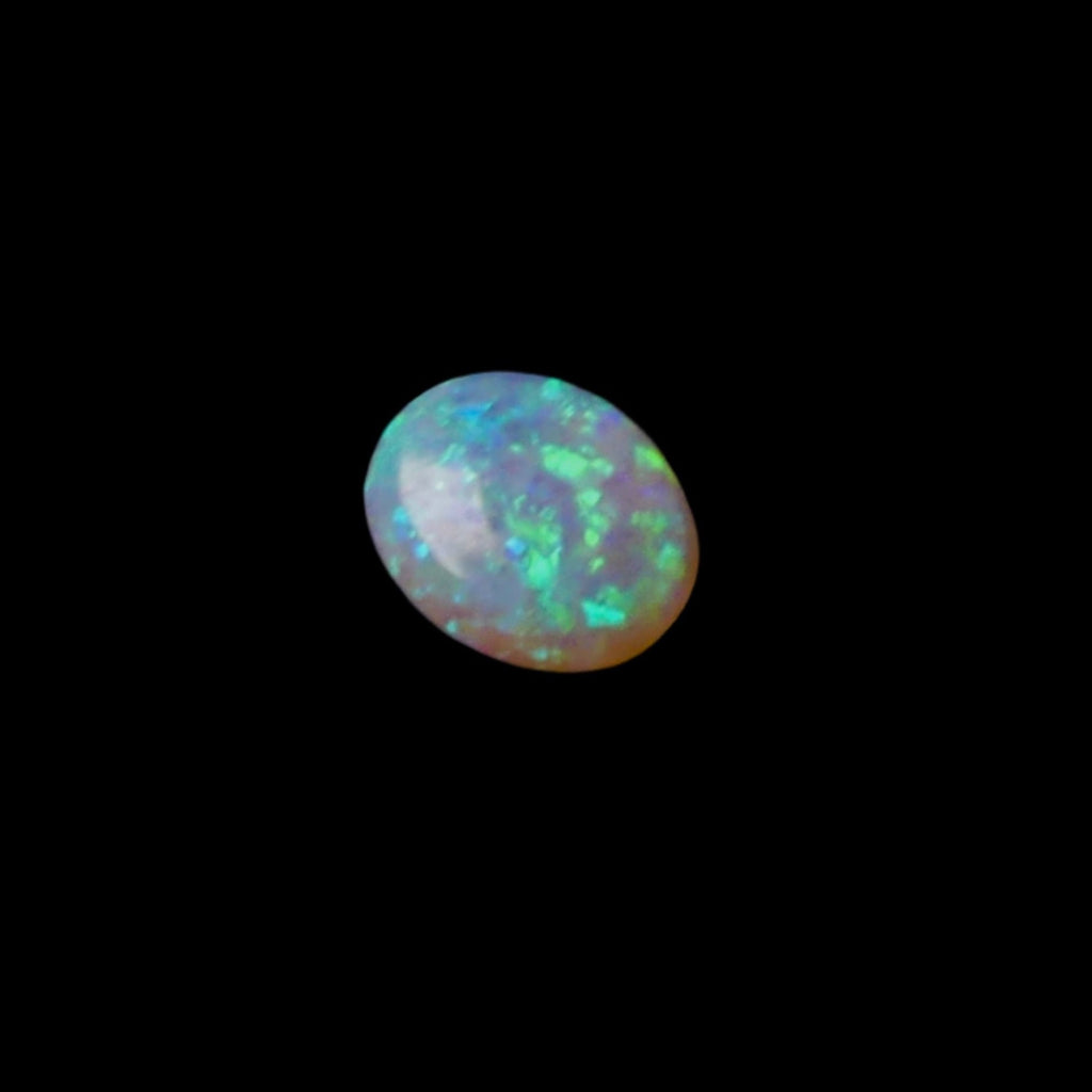 Discover the beauty of this 0.95ct Australian Crystal Opal, ethically mined from Lightning Ridge. Admire the mesmerizing blue and green tones of this truly unique gemstone.

Origin- Ethically Mined in Lightning Ridge Australia

Pattern- Displaying the highly desirable chaff pattern displaying blue green hues

Opal Weight- 0.95ct Lightning Ridge Crystal Opal

Size- 7 x 6 x 3.2m

Cut- Freeform Medium Dome Cabochon