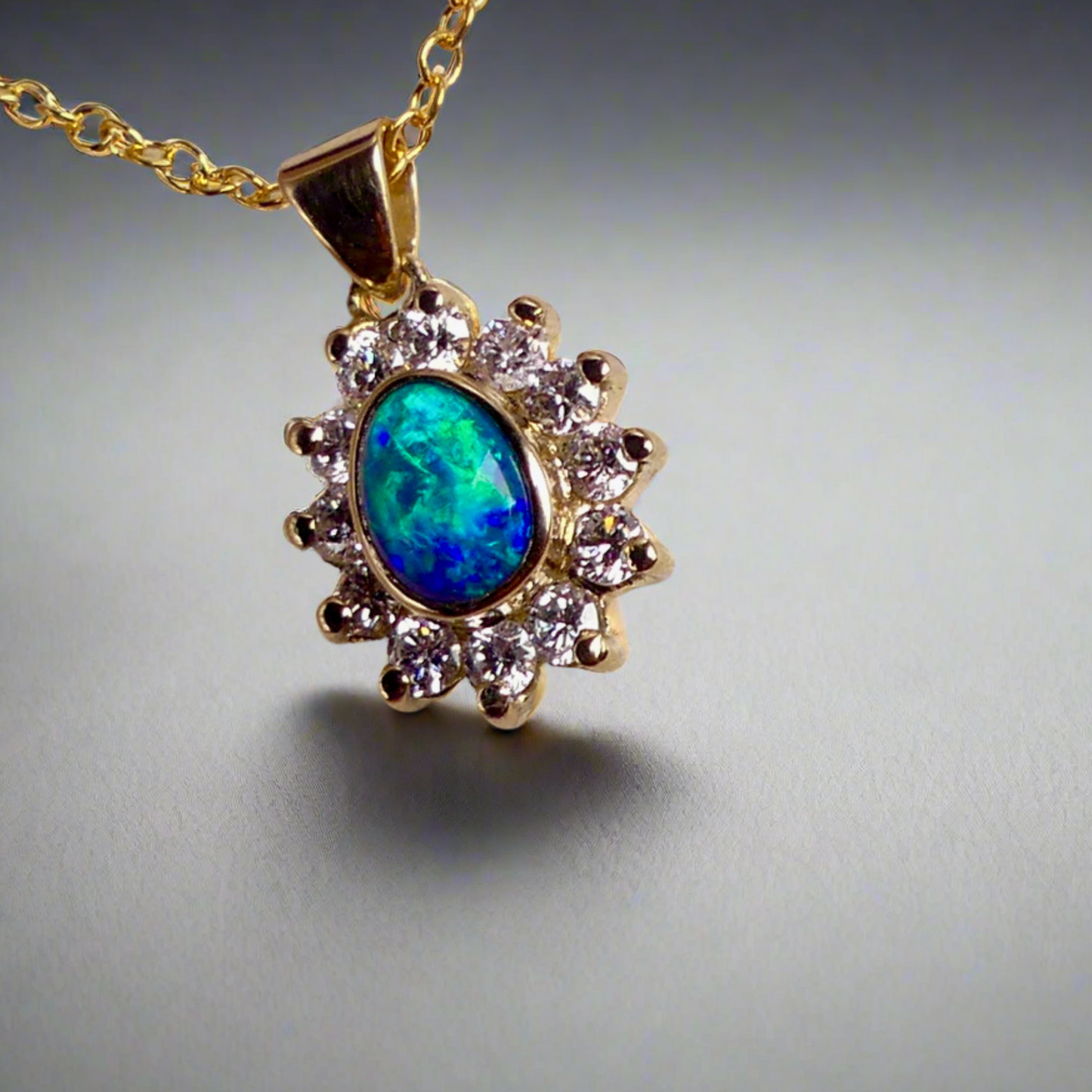 Experience the captivating allure of this handcrafted 18K Yellow Gold Opal &amp; Diamond Halo Pendant. With a striking Lightning Ridge opal showcasing a rare and sought-after script pattern consisting of blue, green, and gold tones, complemented by radiant diamonds, this necklace is a sophisticated and essential piece for any collection.

Origin- Lightning Ridge Australia

Opal Weight- 1ct Australian Lightning Ridge Semi Black Opal

Setting- 18k Yellow Gold Bezel set, claw set Diamond Halo
