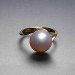 Expertly crafted and adorned with a lustrous South Sea pearl, this 14k gold ring exudes elegance and sophistication. Each pearl is hand-selected for its stunning size and natural colors, making each ring one-of-a-kind. Elevate any outfit with this timeless and luxurious piece.

Pearl- South Sea

Size- 11mm

Luster- AAA/AA

Setting- 14k Gold Handcrafted

Size- 7us

Handcrafted By Australian Artisans.
