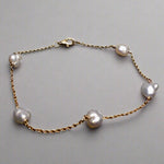 Expertly crafted with 9k gold and 5 Keshi pearls, our Elegant Keshi Pearl Bracelet exudes timeless sophistication. Each pearl's unique shape adds to the overall elegance of the piece, making it a perfect accessory for any occasion. Elevate your style with this exquisite bracelet.

Pearl- Keshi Saltwater Pearls

Setting- Handcrafted 9k Gold

Handcrafted By Australian Artisans