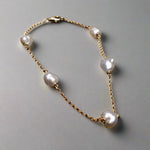 Expertly crafted with 9k gold and 5 Keshi pearls, our Elegant Keshi Pearl Bracelet exudes timeless sophistication. Each pearl's unique shape adds to the overall elegance of the piece, making it a perfect accessory for any occasion. Elevate your style with this exquisite bracelet.

Pearl- Keshi Saltwater Pearls

Setting- Handcrafted 9k Gold

Handcrafted By Australian Artisans
