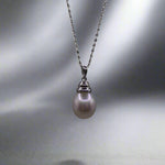 This beautiful sterling silver drop pearl pendant is the perfect addition to any jewelry collection. Made with high-quality materials, the elegant design exudes sophistication and grace. The lustrous South Sea pearl centerpiece adds a touch of luxury and can elevate any outfit. Enhance your style with this timeless accessory.

Pearl- South Sea Drop Pearl

Luster- AAA/AA

Size- 10mm

Setting- Sterling SIlver

Chain- Sterling Silver

Handcrafted By Australian Artisans