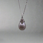 This beautiful sterling silver drop pearl pendant is the perfect addition to any jewelry collection. Made with high-quality materials, the elegant design exudes sophistication and grace. The lustrous South Sea pearl centerpiece adds a touch of luxury and can elevate any outfit. Enhance your style with this timeless accessory.

Pearl- South Sea Drop Pearl

Luster- AAA/AA

Size- 10mm

Setting- Sterling SIlver

Chain- Sterling Silver

Handcrafted By Australian Artisans