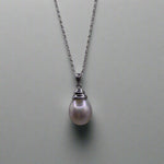 This beautiful sterling silver drop pearl pendant is the perfect addition to any jewelry collection. Made with high-quality materials, the elegant design exudes sophistication and grace. The lustrous South Sea pearl centerpiece adds a touch of luxury and can elevate any outfit. Enhance your style with this timeless accessory.

Pearl- South Sea Drop Pearl

Luster- AAA/AA

Size- 10mm

Setting- Sterling SIlver

Chain- Sterling Silver

Handcrafted By Australian Artisans