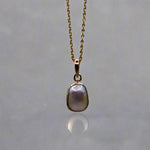 Elevate your style with our Stunning Keshi Pearl 9k Gold Pendant. Crafted with expert precision and adorned with a exquisite Keshi pearl, this pendant exudes elegance and sophistication. Made with high quality 9k gold, it's a timeless piece that adds a touch of luxury to any outfit.

Pearl- Keshi Saltwater Pearl

Setting- Handcrafted 9k gold

Chain- 9k Gold 45cm in length

Handcrafted By Australian Artisans