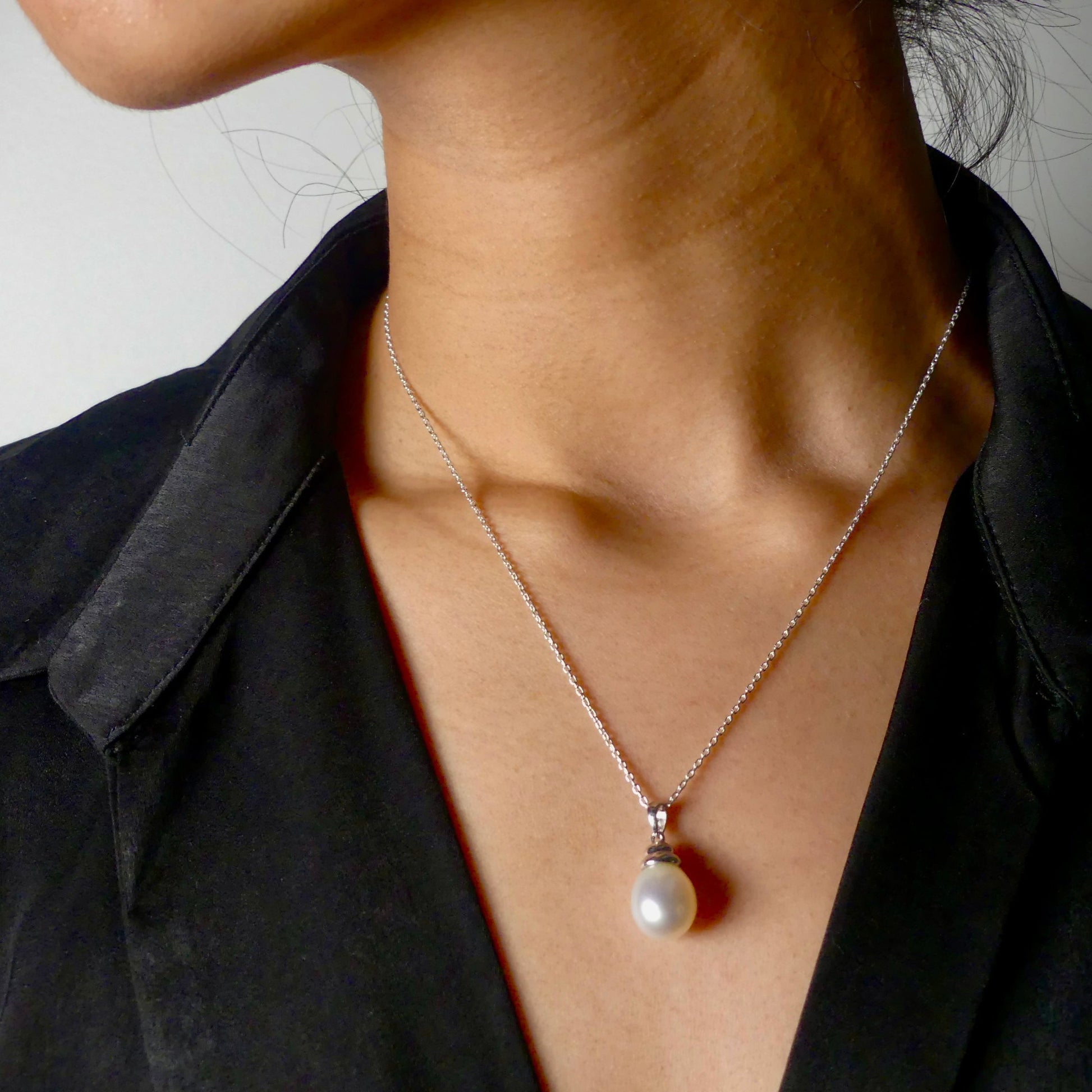 This beautiful sterling silver drop pearl pendant is the perfect addition to any jewelry collection. Made with high-quality materials, the elegant design exudes sophistication and grace. The lustrous South Sea pearl centerpiece adds a touch of luxury and can elevate any outfit. Enhance your style with this timeless accessory.

Pearl- South Sea Drop Pearl

Luster- AAA/AA

Size- 10mm

Setting- Sterling SIlver

Chain- Sterling Silver

Handcrafted By Australian Artisans