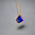 Expertly crafted, this Beautiful Australian Boulder Opal 18k Gold Pendant is a stunning piece of jewelry. Featuring a mesmerizing display of ocean blues and greens, this pendant is complemented by a solid 18k gold chain. Elevate any outfit with this unique and luxurious accessory.

Setting- 18k Gold bezel set

Opal Weight- 4.9ct

Origin- Queensland Australia

Chain- 18k gold cable chan, 45cm in Length

Expertly Handcrafted By Australian Artisans
