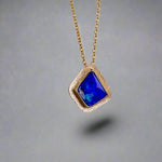 Expertly crafted, this Beautiful Australian Boulder Opal 18k Gold Pendant is a stunning piece of jewelry. Featuring a mesmerizing display of ocean blues and greens, this pendant is complemented by a solid 18k gold chain. Elevate any outfit with this unique and luxurious accessory.

Setting- 18k Gold bezel set

Opal Weight- 4.9ct

Origin- Queensland Australia

Chain- 18k gold cable chan, 45cm in Length

Expertly Handcrafted By Australian Artisans
