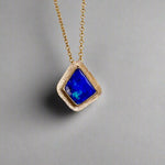 Expertly crafted, this Beautiful Australian Boulder Opal 18k Gold Pendant is a stunning piece of jewelry. Featuring a mesmerizing display of ocean blues and greens, this pendant is complemented by a solid 18k gold chain. Elevate any outfit with this unique and luxurious accessory.

Setting- 18k Gold bezel set

Opal Weight- 4.9ct

Origin- Queensland Australia

Chain- 18k gold cable chan, 45cm in Length

Expertly Handcrafted By Australian Artisans
