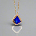 Expertly crafted, this Beautiful Australian Boulder Opal 18k Gold Pendant is a stunning piece of jewelry. Featuring a mesmerizing display of ocean blues and greens, this pendant is complemented by a solid 18k gold chain. Elevate any outfit with this unique and luxurious accessory.

Setting- 18k Gold bezel set

Opal Weight- 4.9ct

Origin- Queensland Australia

Chain- 18k gold cable chan, 45cm in Length

Expertly Handcrafted By Australian Artisans
