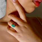 Expertly crafted, this stunning ring features a rare Australian gem boulder opal set in 14k gold and adorned with sparkling diamonds. The unique combination of precious materials and meticulous design makes this ring a one-of-a-kind piece, perfect for any special occasion or as a luxurious addition to any jewelry collection.

Origin- Queensland Australia

Opal Weight- 2.2ct Gem Australian Boulder Opal

Accent Stones- Natural Diamonds

Setting- 14K Gold Bezel Set

Size- 7 1/2 us
