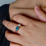 Introducing our stunning Seascapes Collection! This 14k gold ring perfectly captures the beauty and harmony of nature's wonders. Handcrafted to perfection, it is the epitome of elegance.

Origin- Lightning Ridge Australia

Opal Weight- 1ct Australian Black Opal.

Setting- 14k Gold Claw Setting

Accent Stone- Pink Tourmaline

Pearl- Keshi Pearl

Size - 7us -

Handcrafted and designed by Australian Artisans